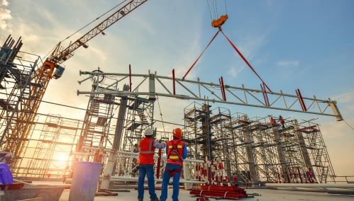 Construction team reviewing plans